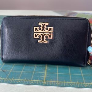 Leather Tory Burch zip around wallet.